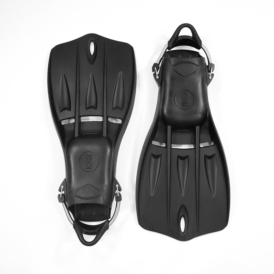A pair of blue Tech Fins designed for scuba diving, featuring a vented blade and spring straps.